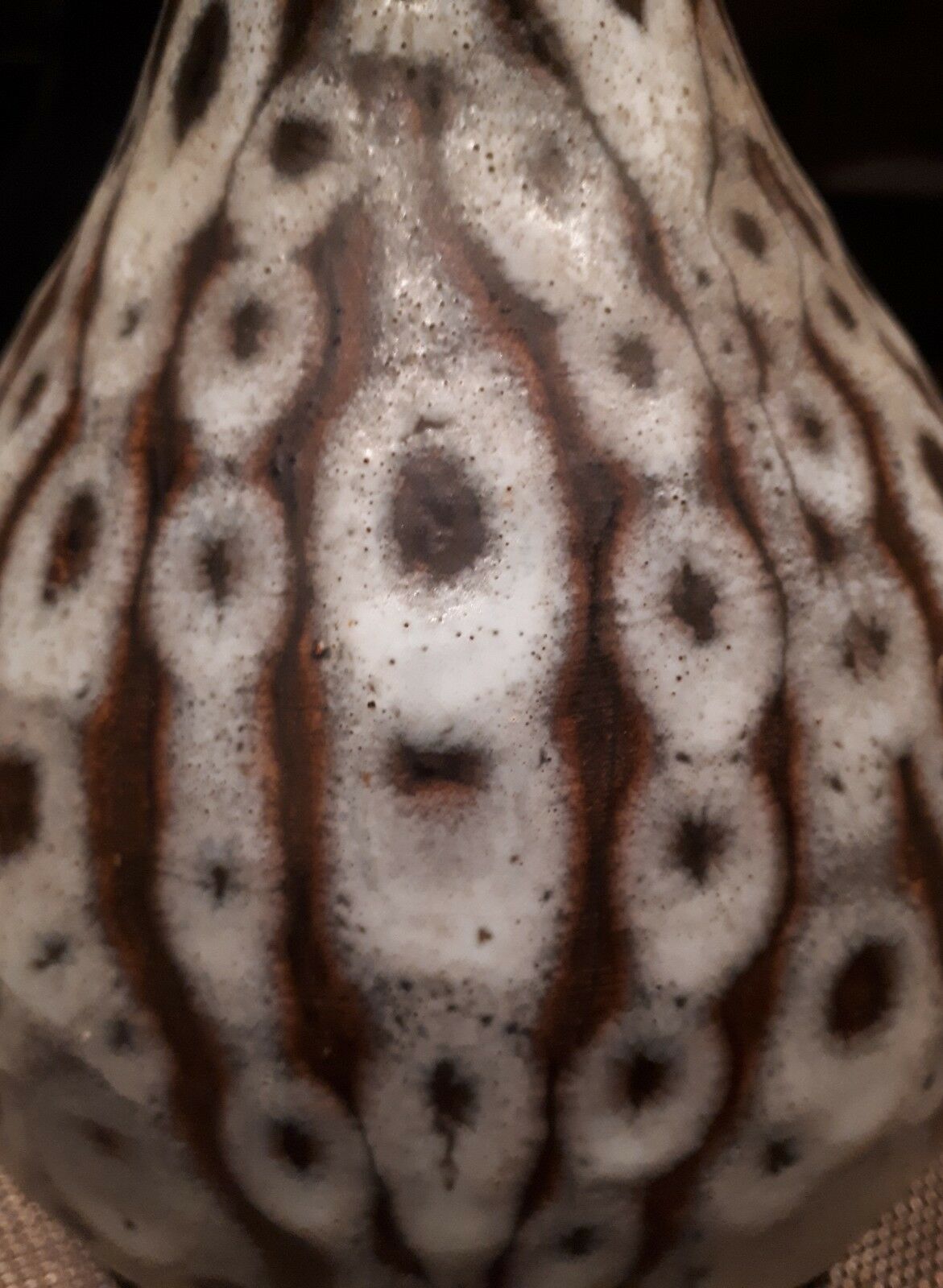 Long-necked vase from the 20s and 40s enamelled sandstone artist Tf's signature