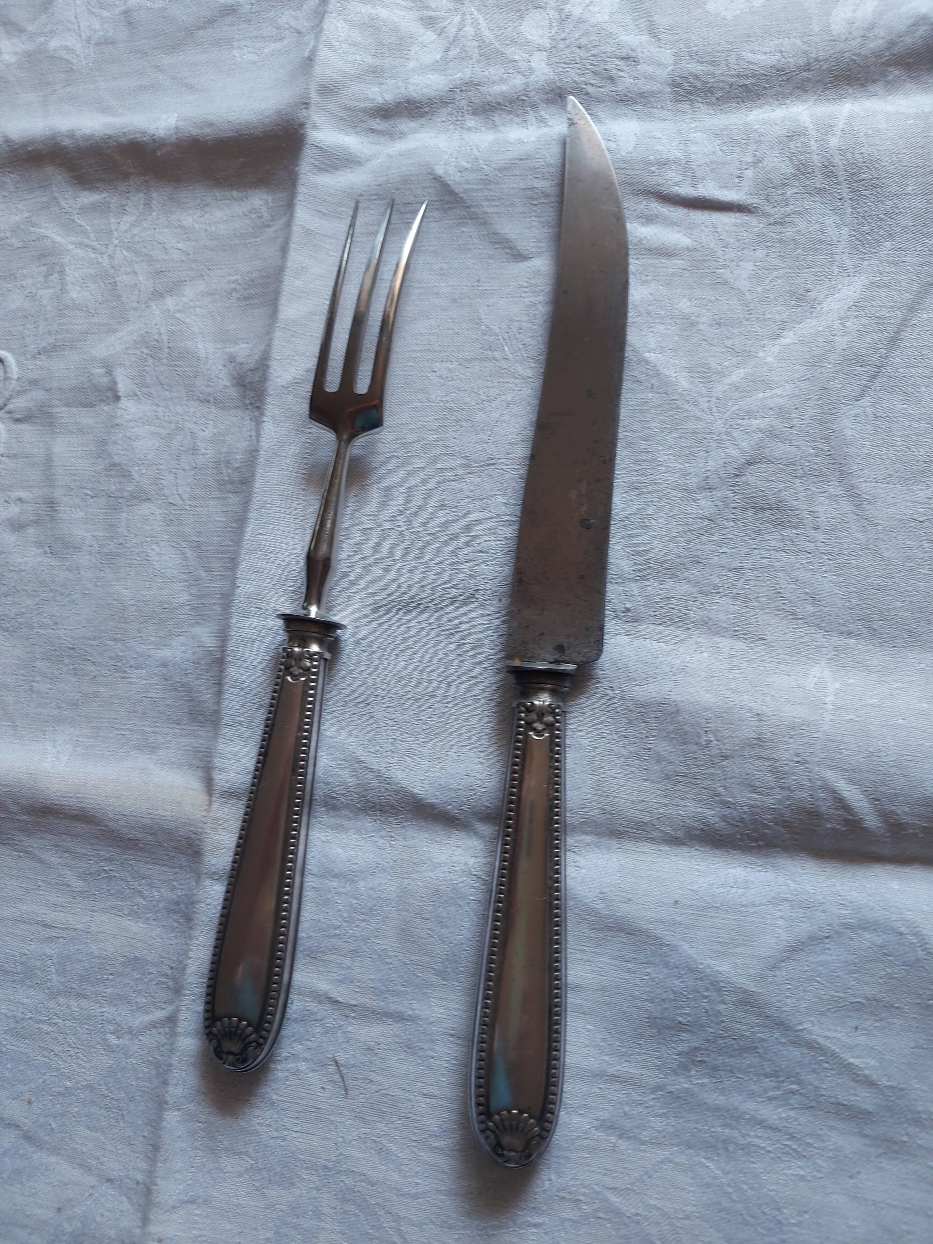 Serving, silvered metal leg cutlery