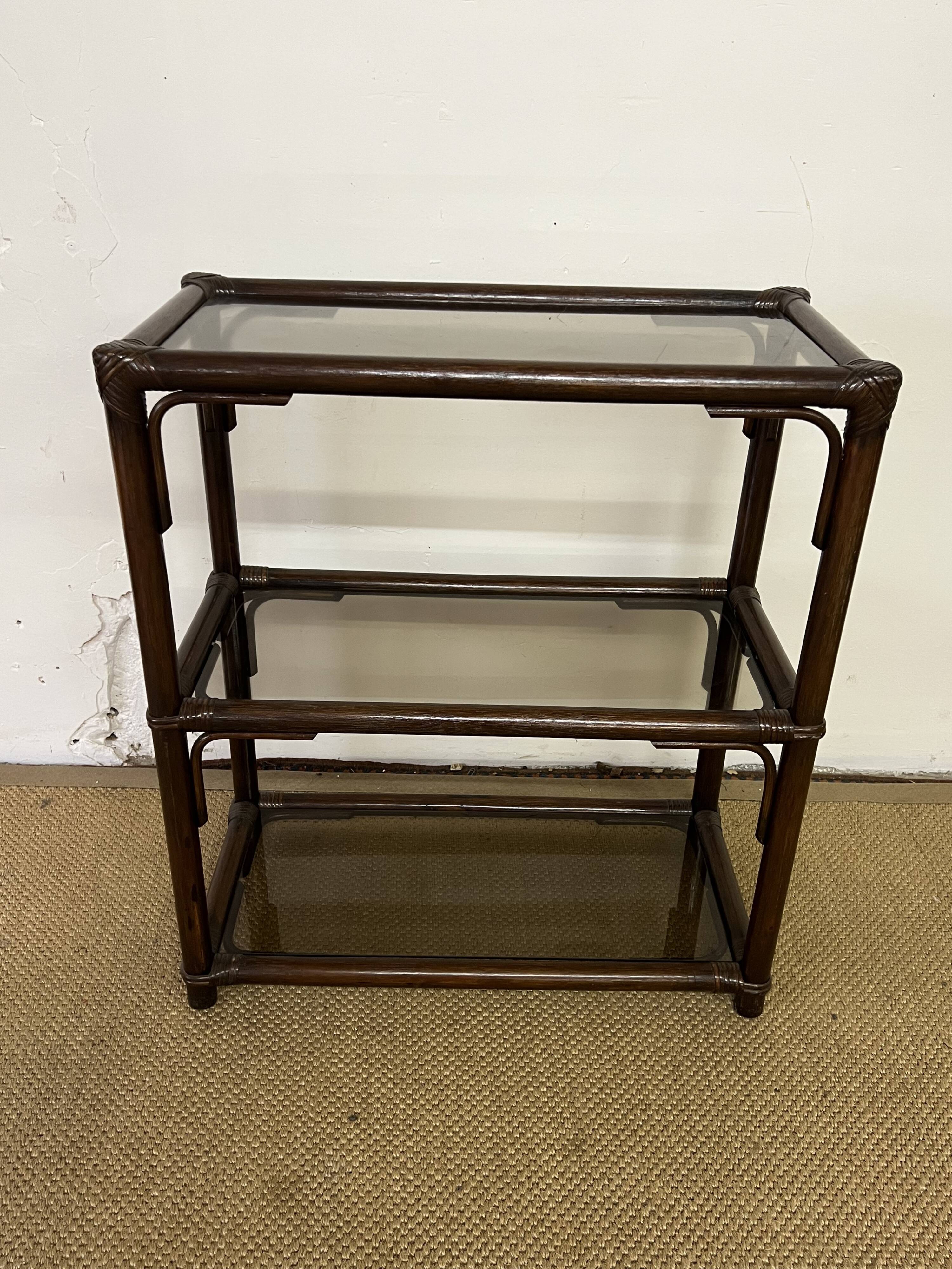 Rattan and smoked glass bookcase shelf