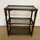 Rattan and smoked glass bookcase shelf