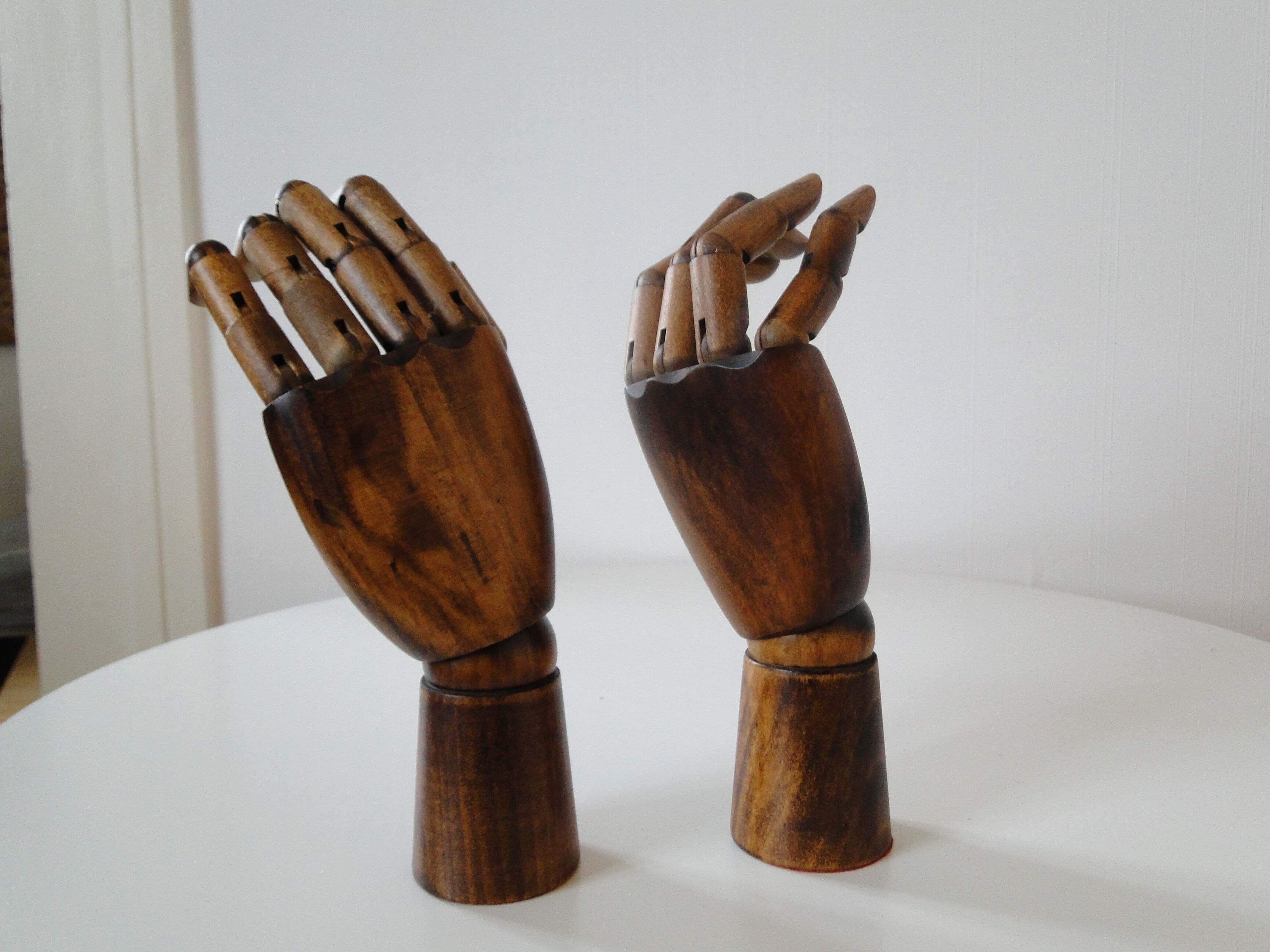 Pair of articulated wooden hands