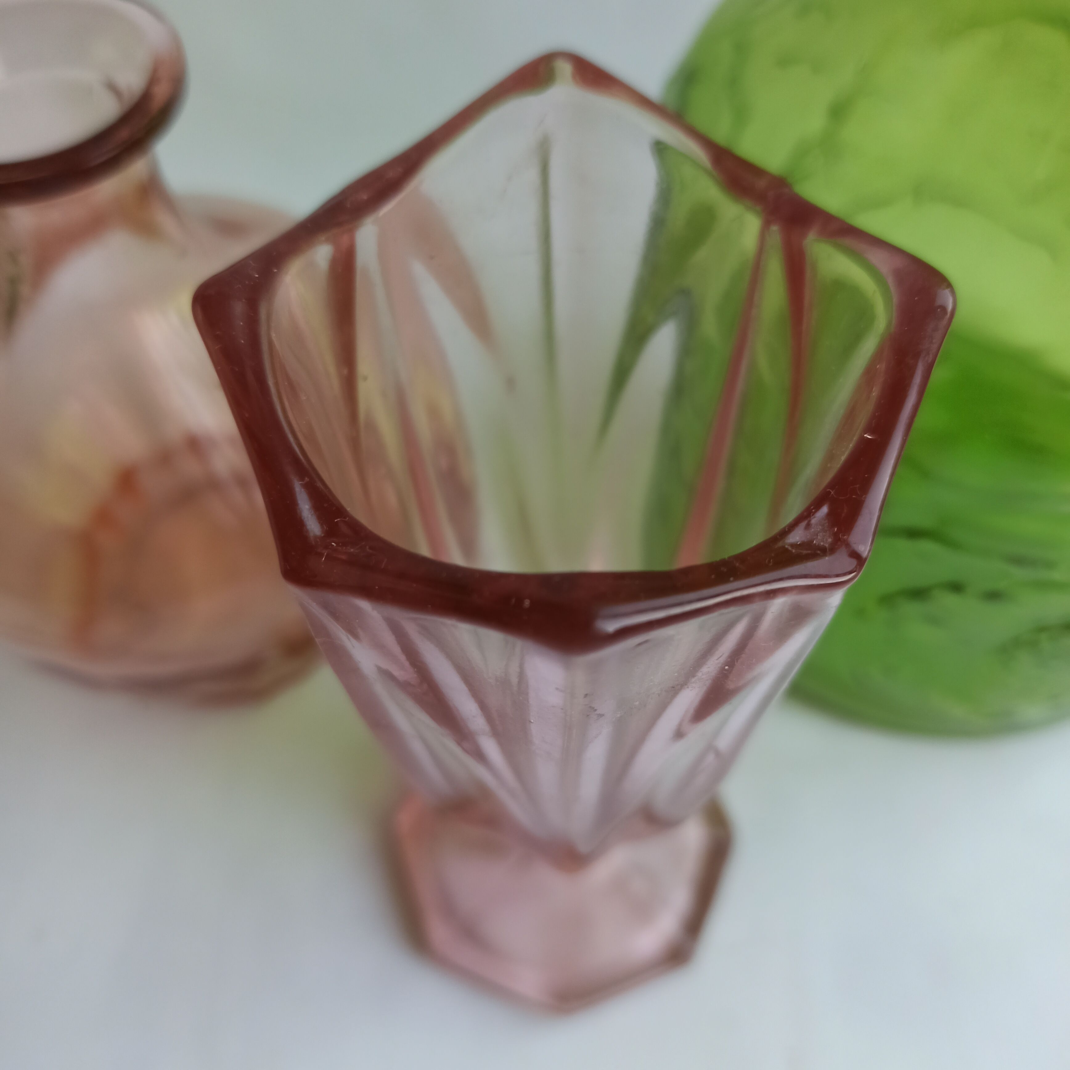 Pink Art Deco tulip vase in moulded glass