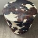 Pouf coffre en peau de vache des années 70