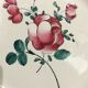Eastern earthenware plate decorated bouquet of flowers