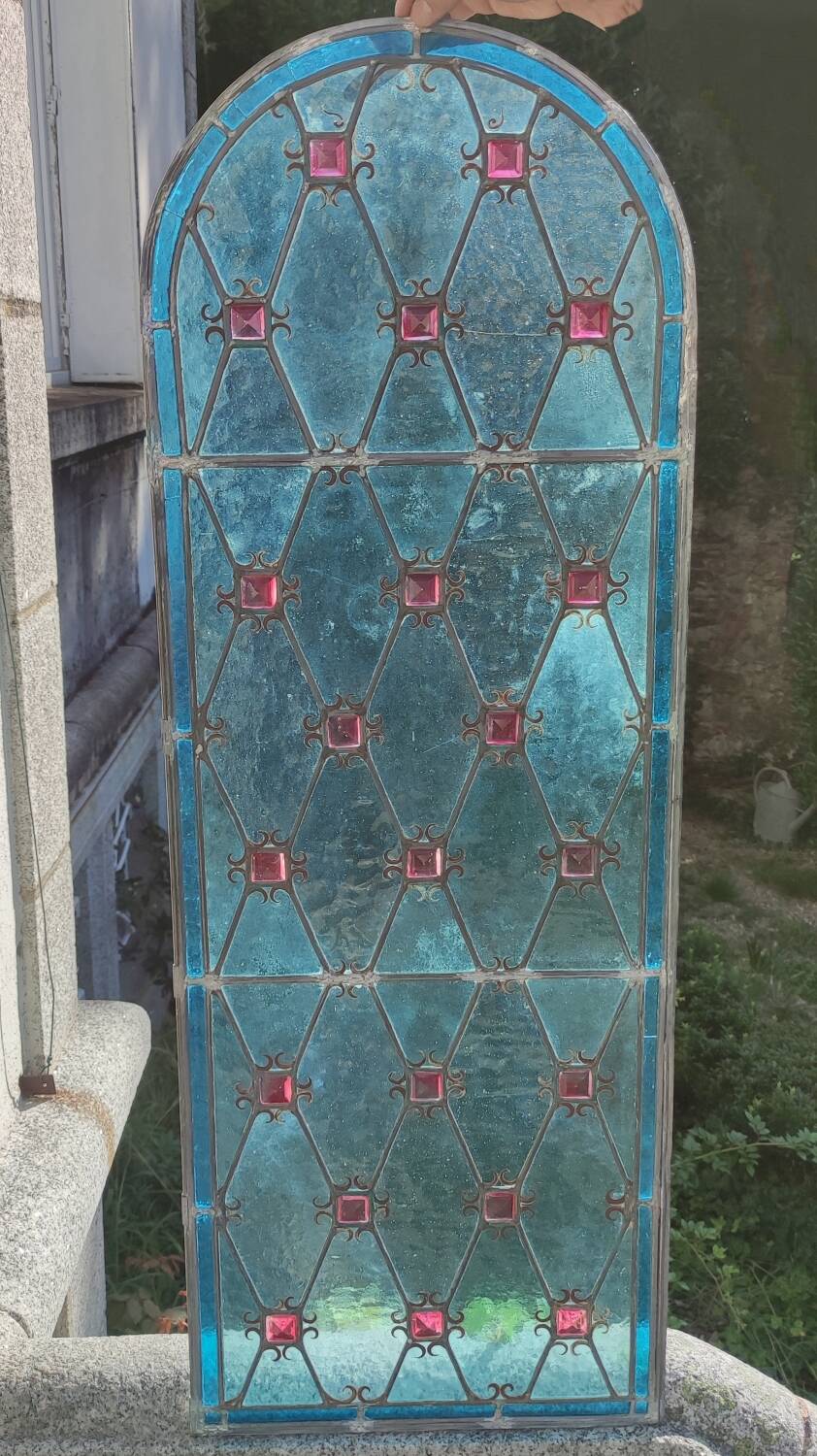 Old stained glass window in the Middle Ages style