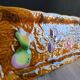 Vintage barbotine pocket dish from Salins les Bains, relief decoration of fruits.