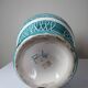 Vintage turquoise ceramic baluster vase with incised decoration.