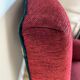 Fauteuil anglais rouge et son repose pied