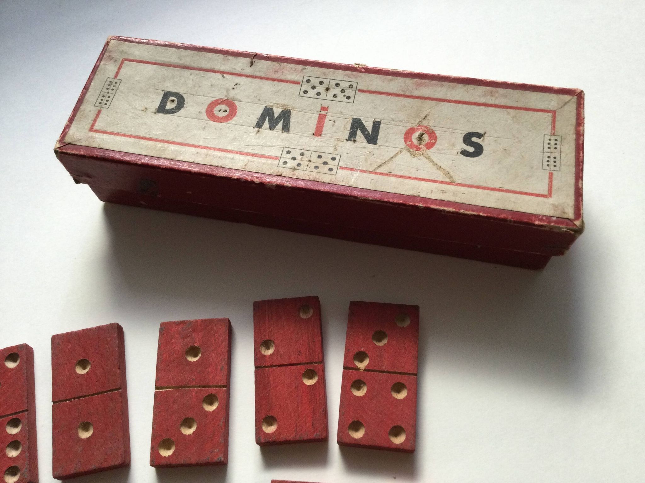 Red wooden dominoes game from the 50s old toy
