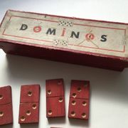 Red wooden dominoes game from the 50s old toy