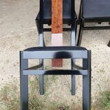 Octagonal table paul michel and its black lacquered chairs and elm magnifying glass