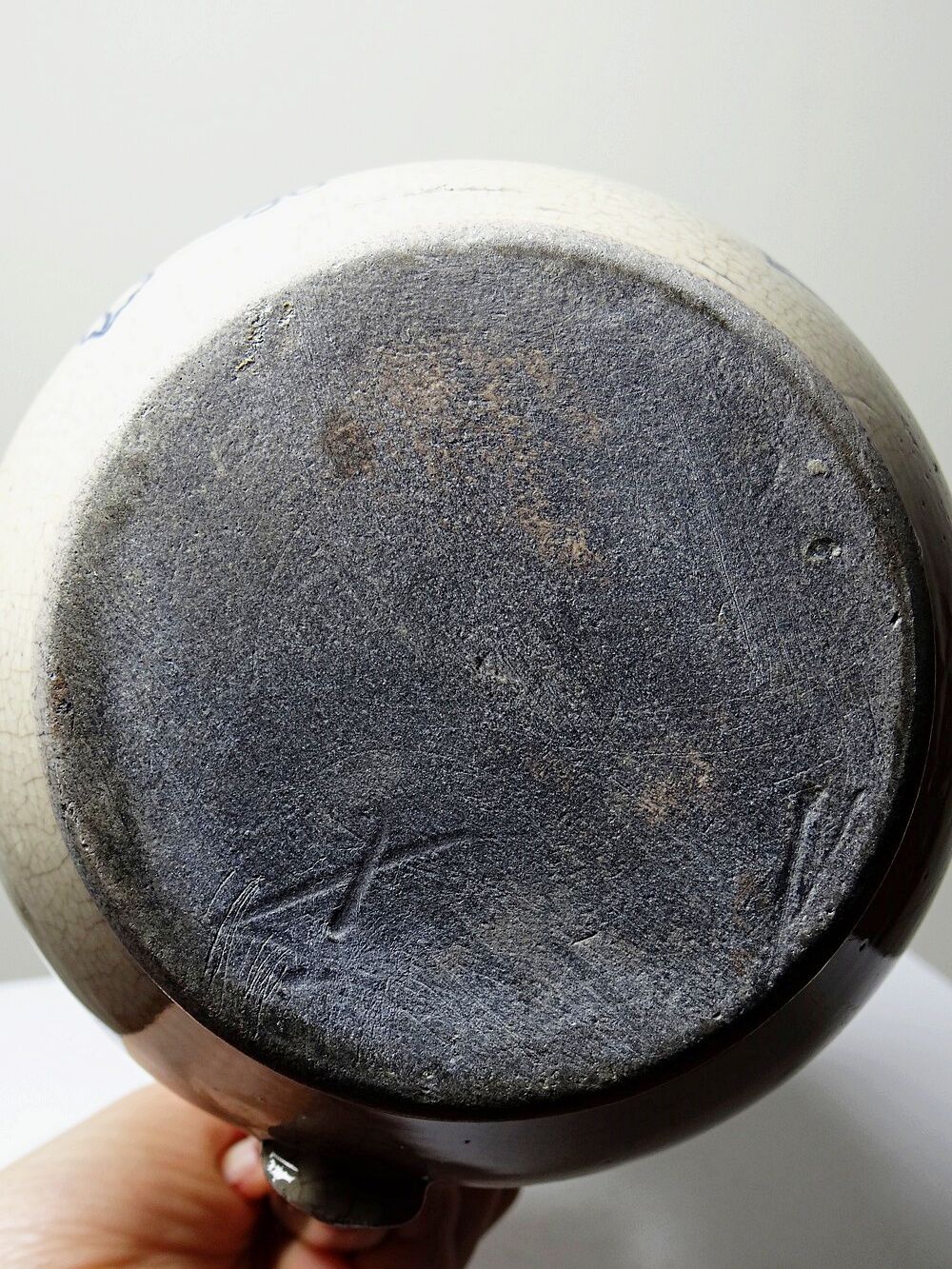 Fine earthenware pitcher with blue decoration, attributed to Saint-Uze, 19th century.