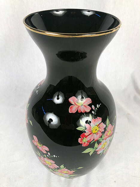 Black opal vase decorated with flowers