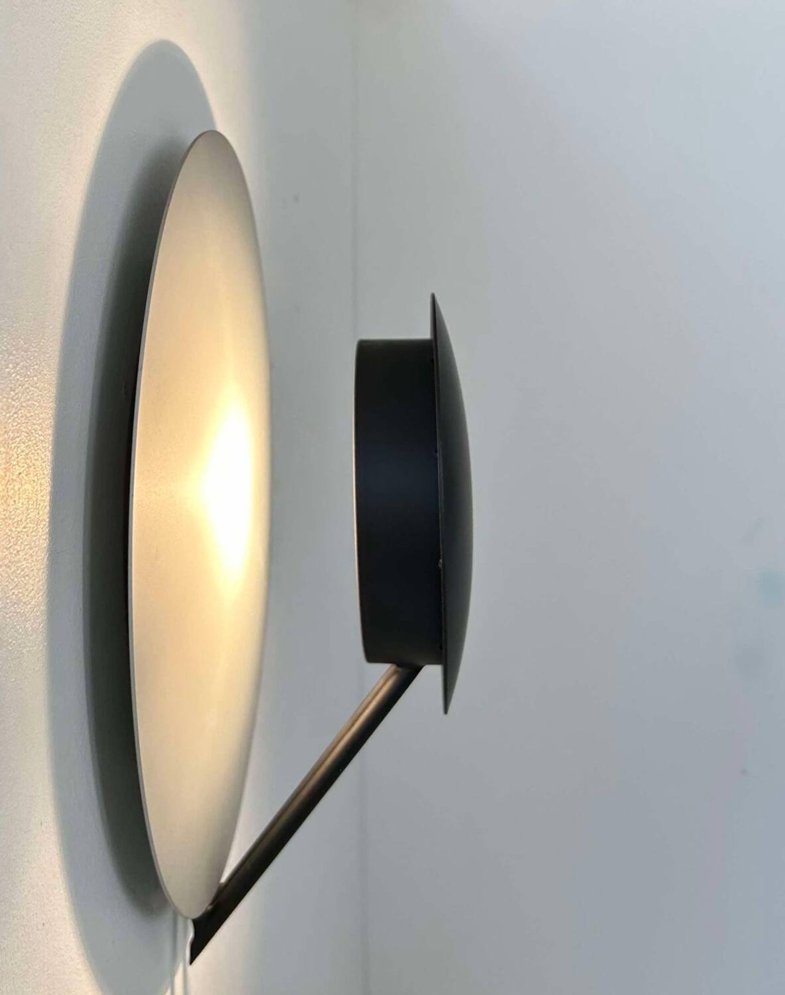 Vintage round wall light, grey and black metal, Italy 1970.