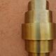 Round Art Deco wall light in brass.