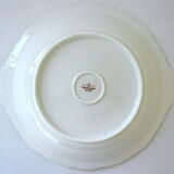 Hollow dish in white porcelain, golden lip.