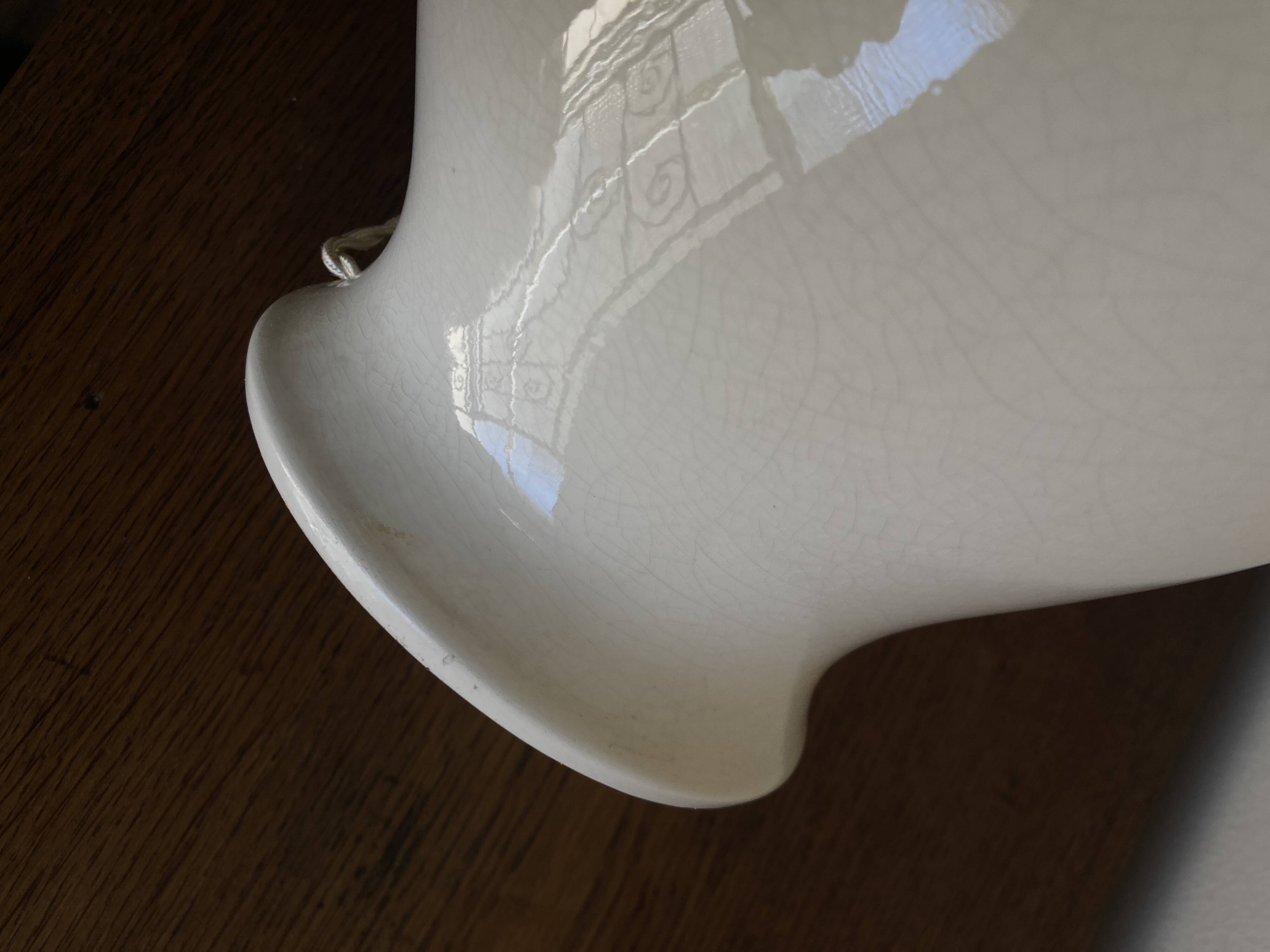 Neo-classical baluster lamp in cracked white earthenware from the 1970s.