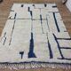 Tapis berbère marocain en laine écru et bleu – 283 x 188 cm