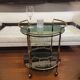 Table d'appoint / barcart / serveuse milieu de siècle, laiton doré et verre fumé, années 70 - Italie.