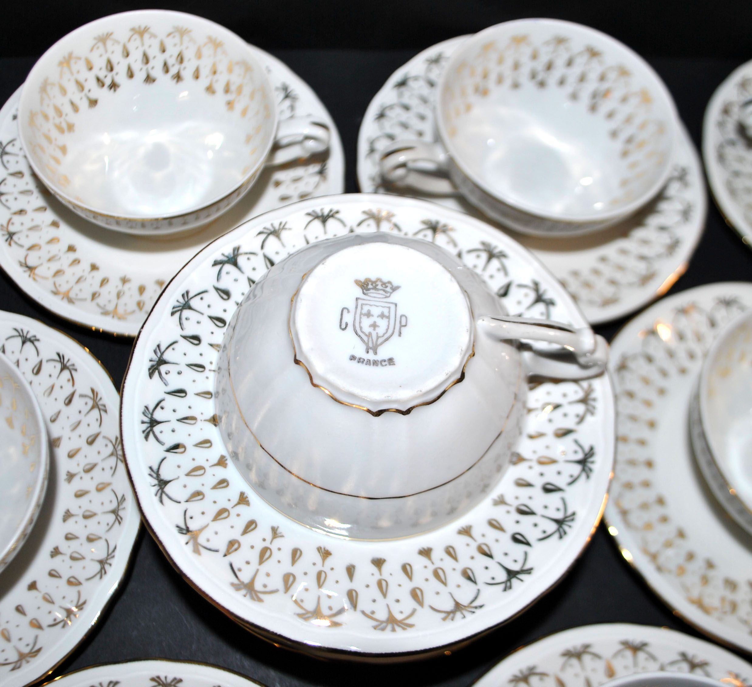 CNP set of 11 porcelain coffee cups from the National Porcelain Company Berry.