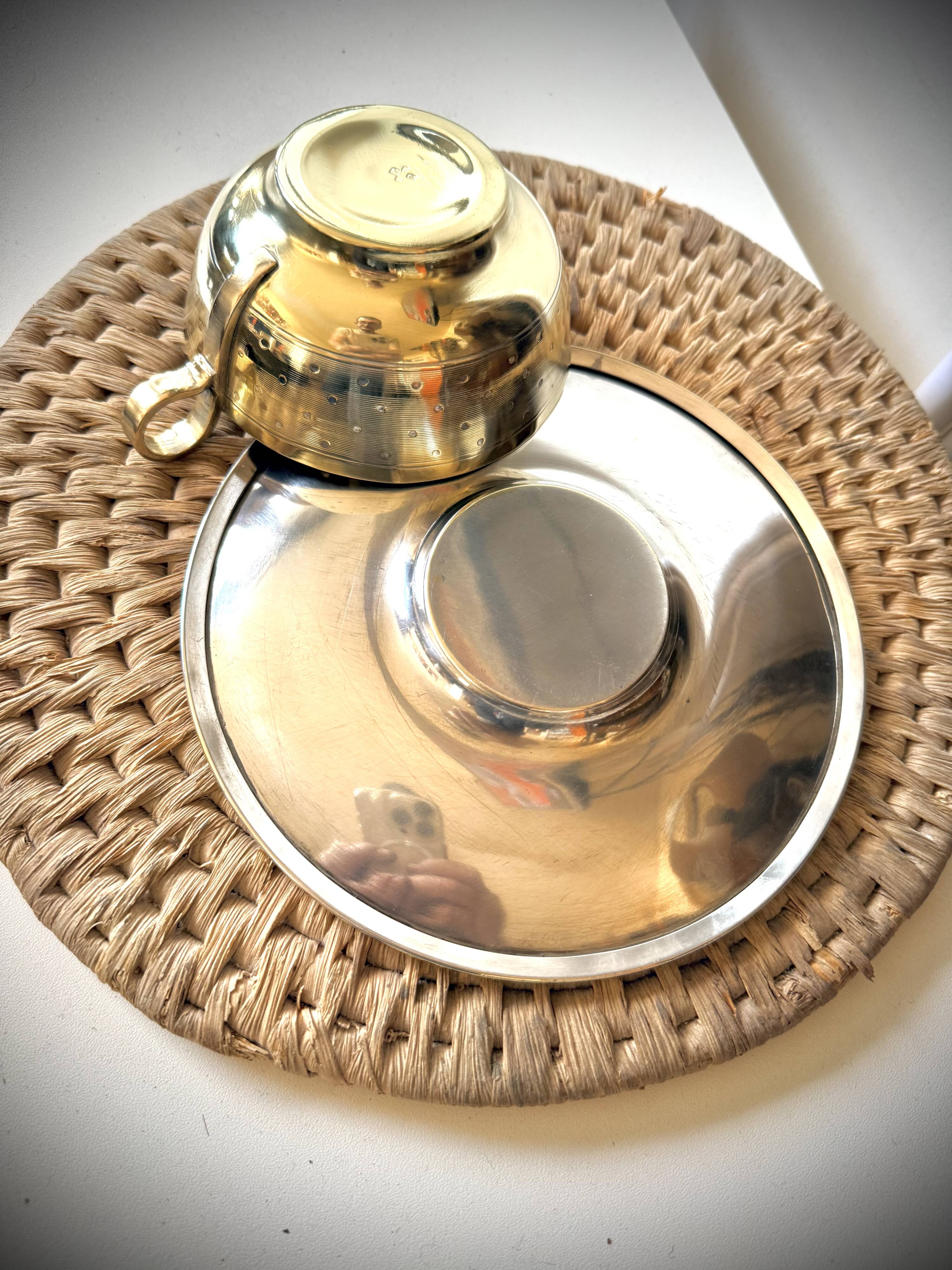 Cup and saucer in brass Saint Médard (18th century)