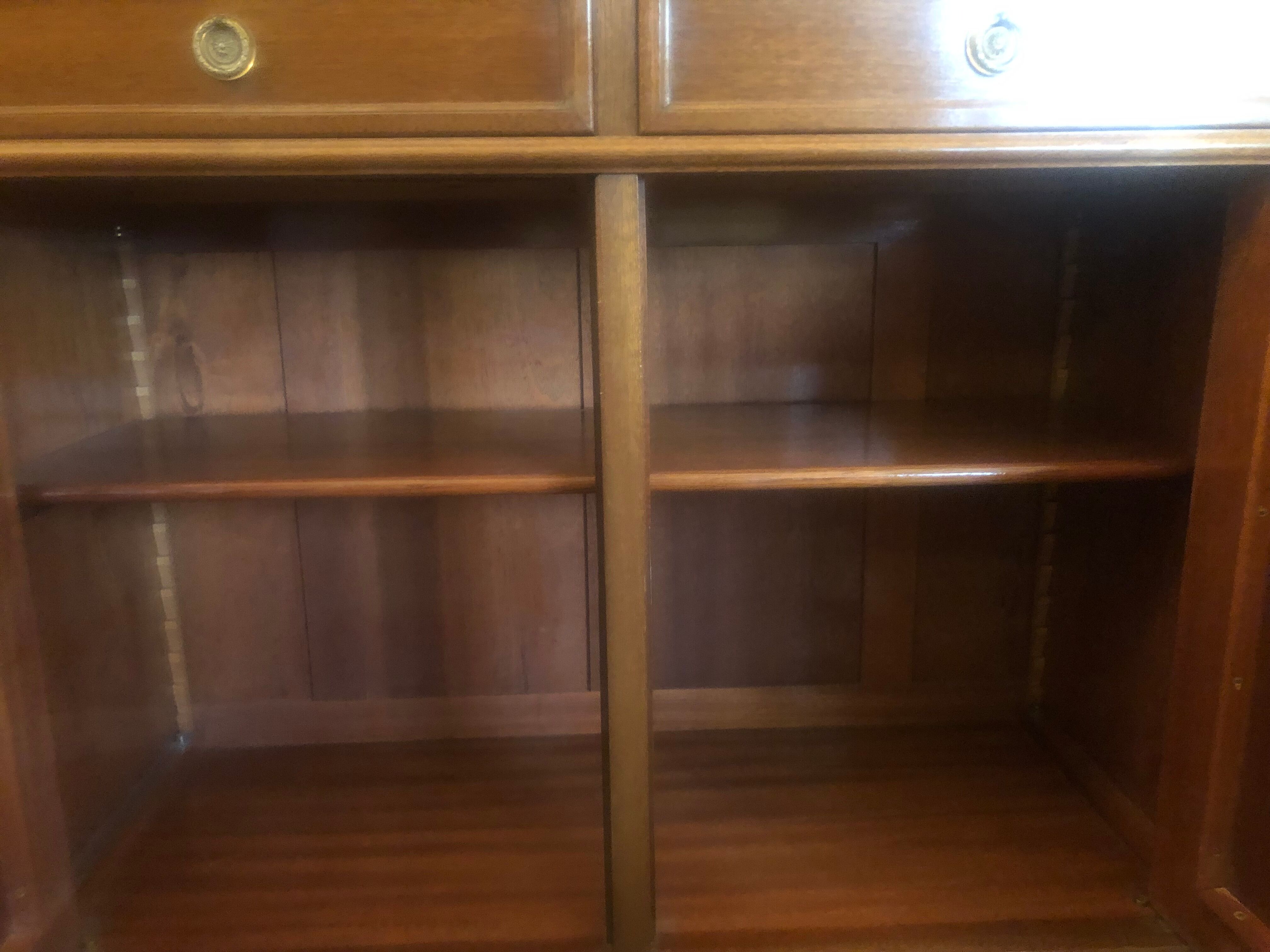 Mahogany wood bookcase and bronze handles