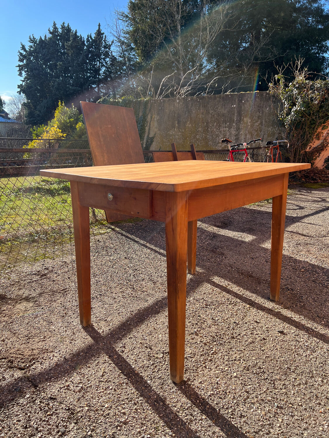 Solid wood table with side drawers