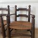 Paire de fauteuils en bois et paille  Charles Dudouyt 