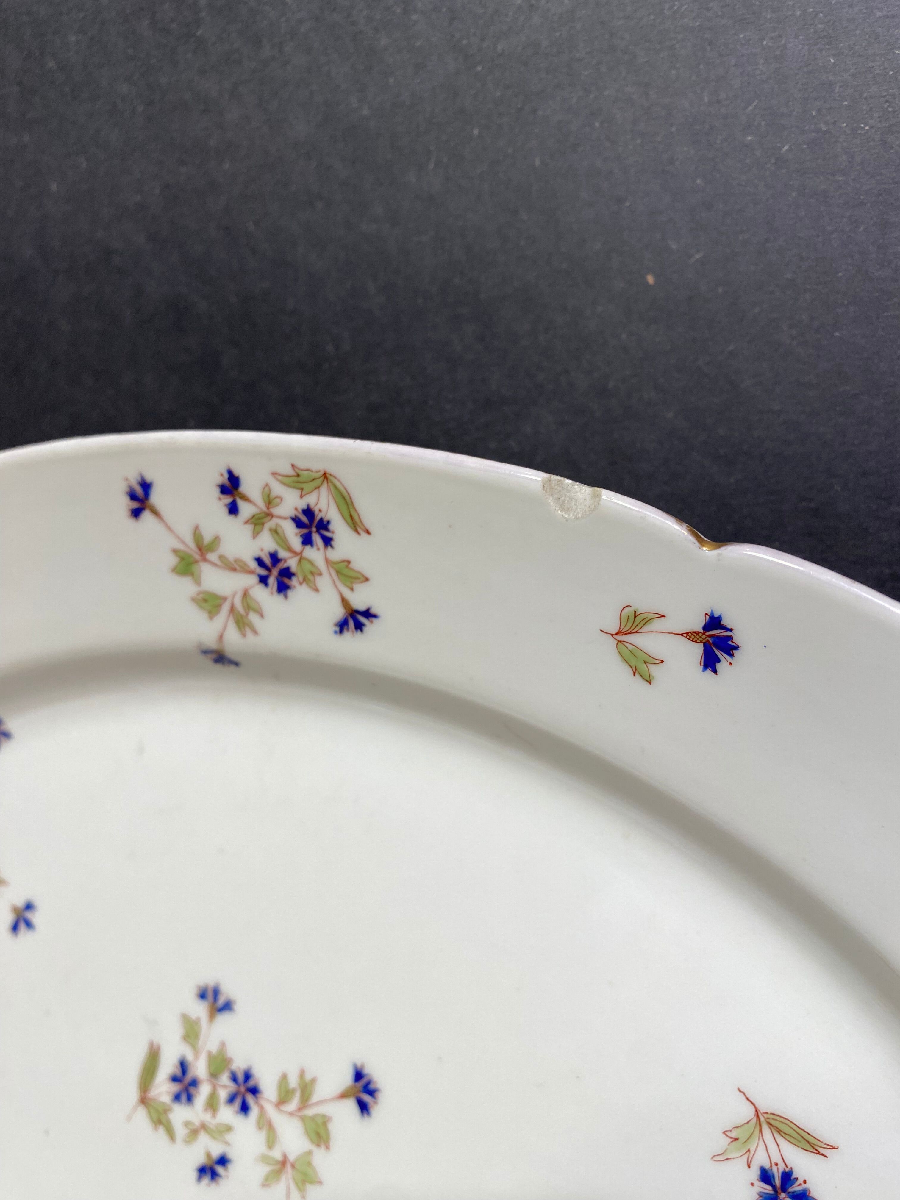 Oval-shaped dish in Limoges porcelain decorated with barbels Louis XV style