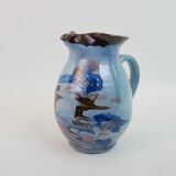 Large blue pitcher with abstract pattern