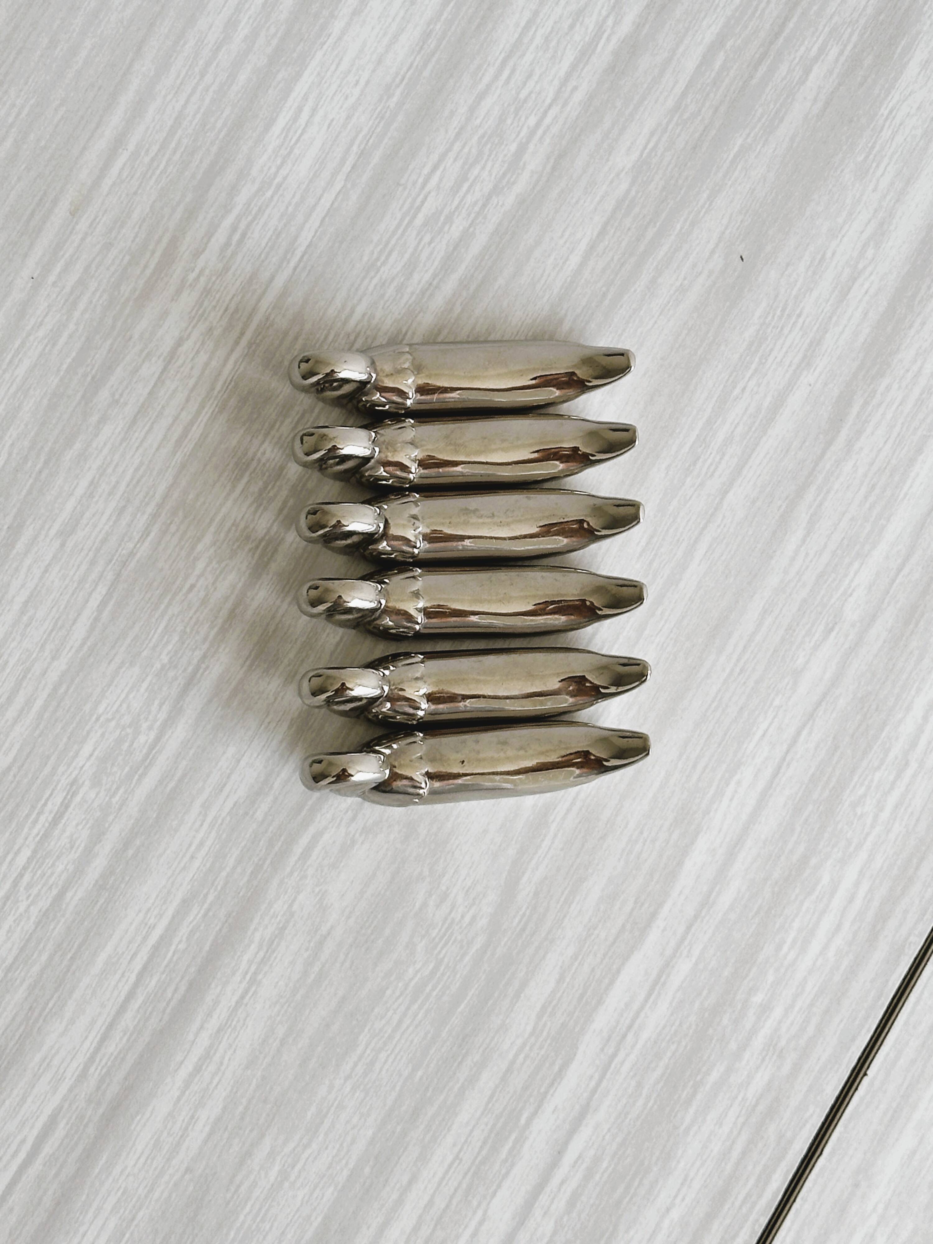 set of 6 silver metal swan-shaped knife holders