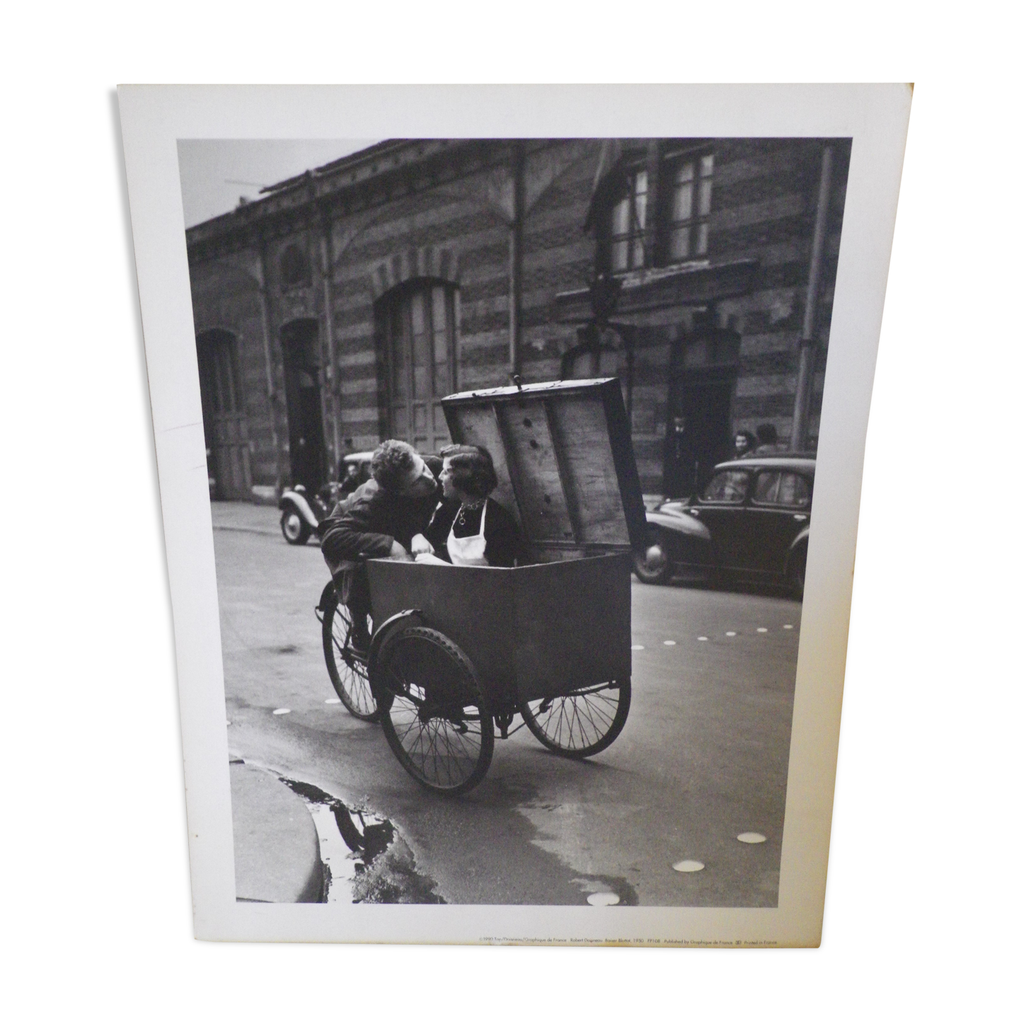 Robert Doisneau's black and white poster "Kiss Blottot" from 1950