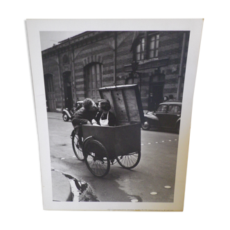 Robert Doisneau's black and white poster "Kiss Blottot" from 1950