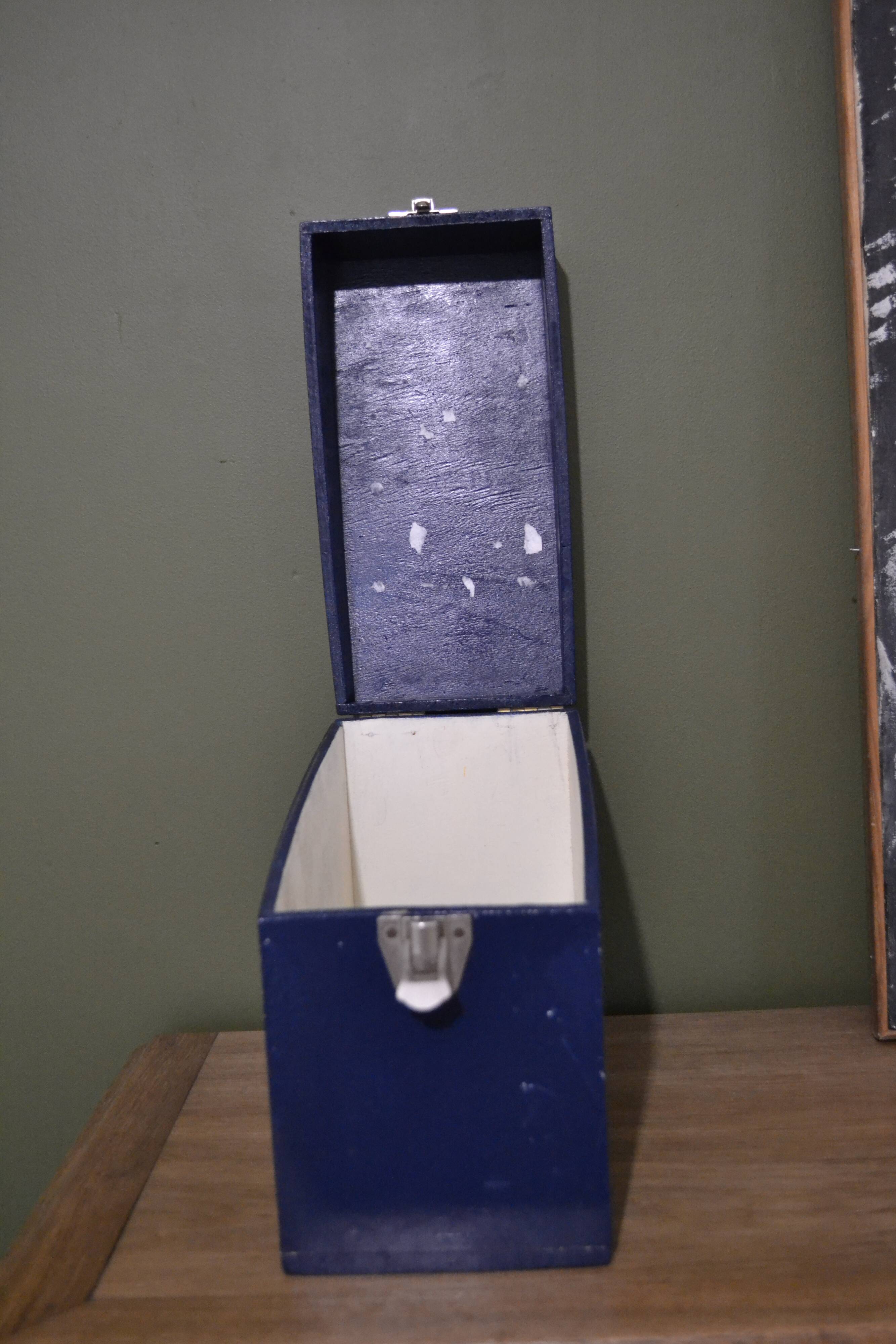 Blue painted wooden plug box
