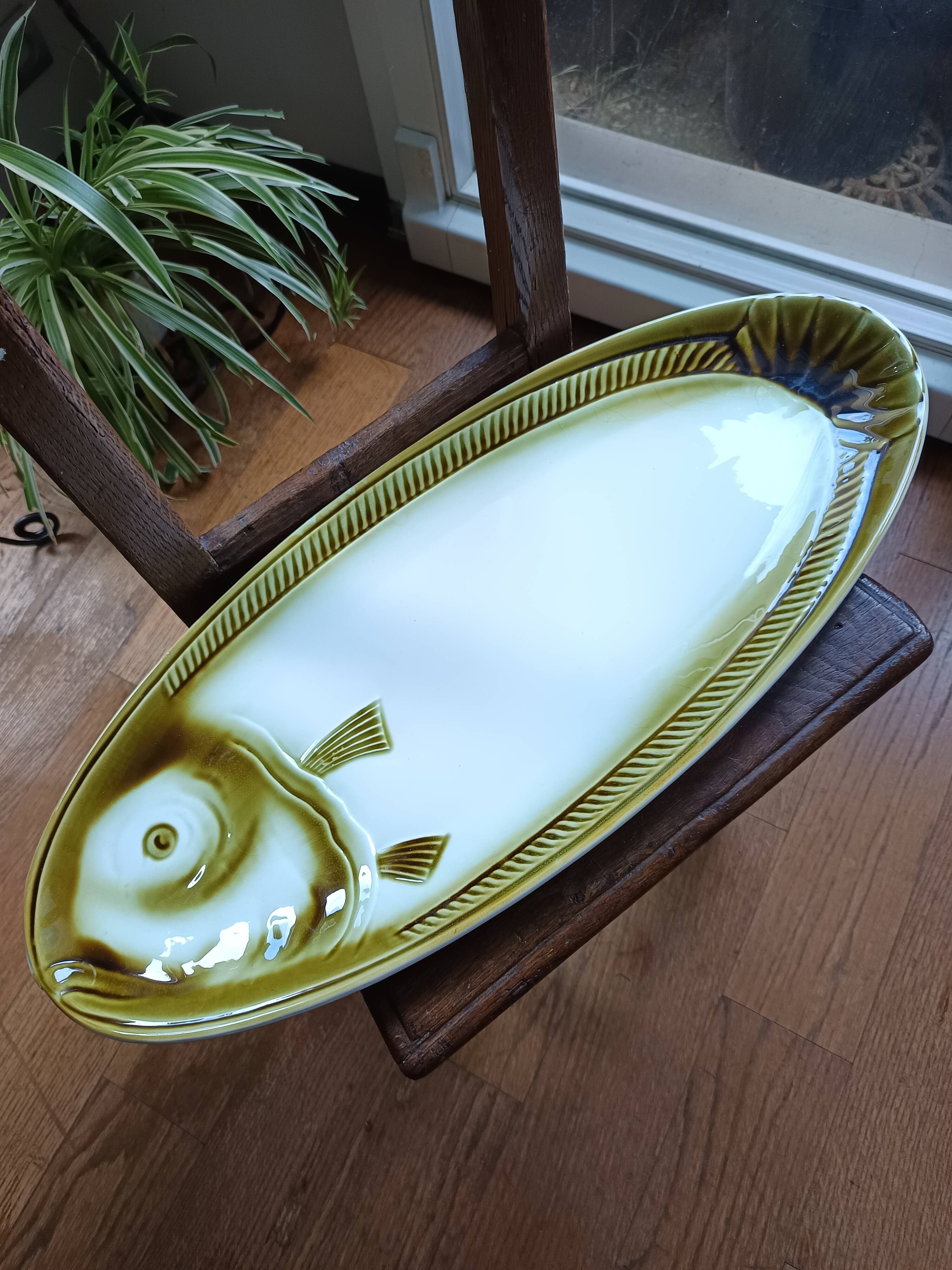 Large ceramic dish in the shape of a fish, Moulin des Loups brand