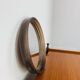 Round mirror with amber rim from the 70s, vintage