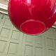 Pair of orange glass ball suspensions, 70s.