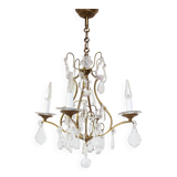 Old French chandelier in gilded brass with tassels