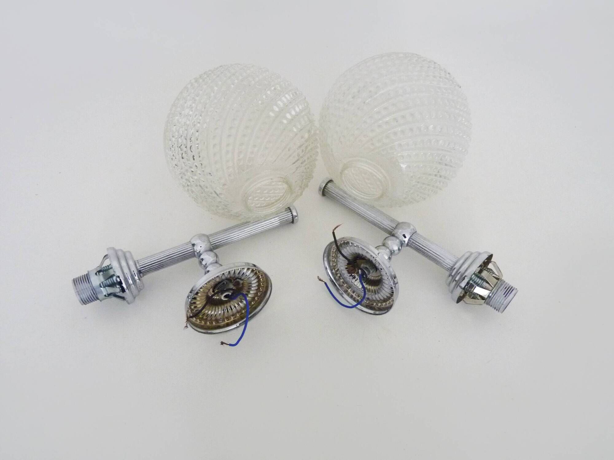 Pair of vintage Karl Lenz wall sconces. Chrome-plated metal and glass