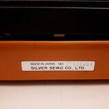 Vintage 70 orange Silver-Reed 100
