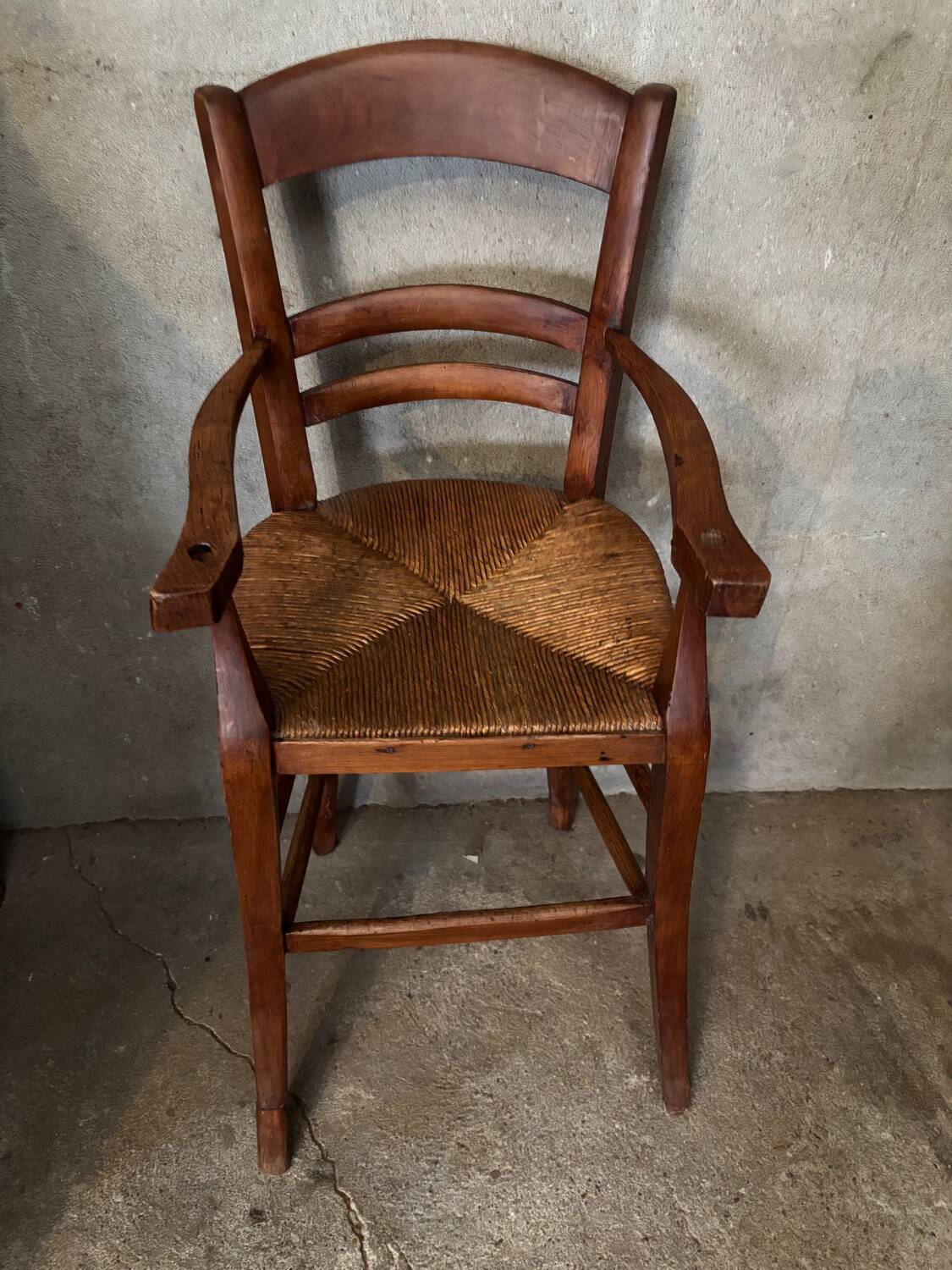 Old straw baby high chair