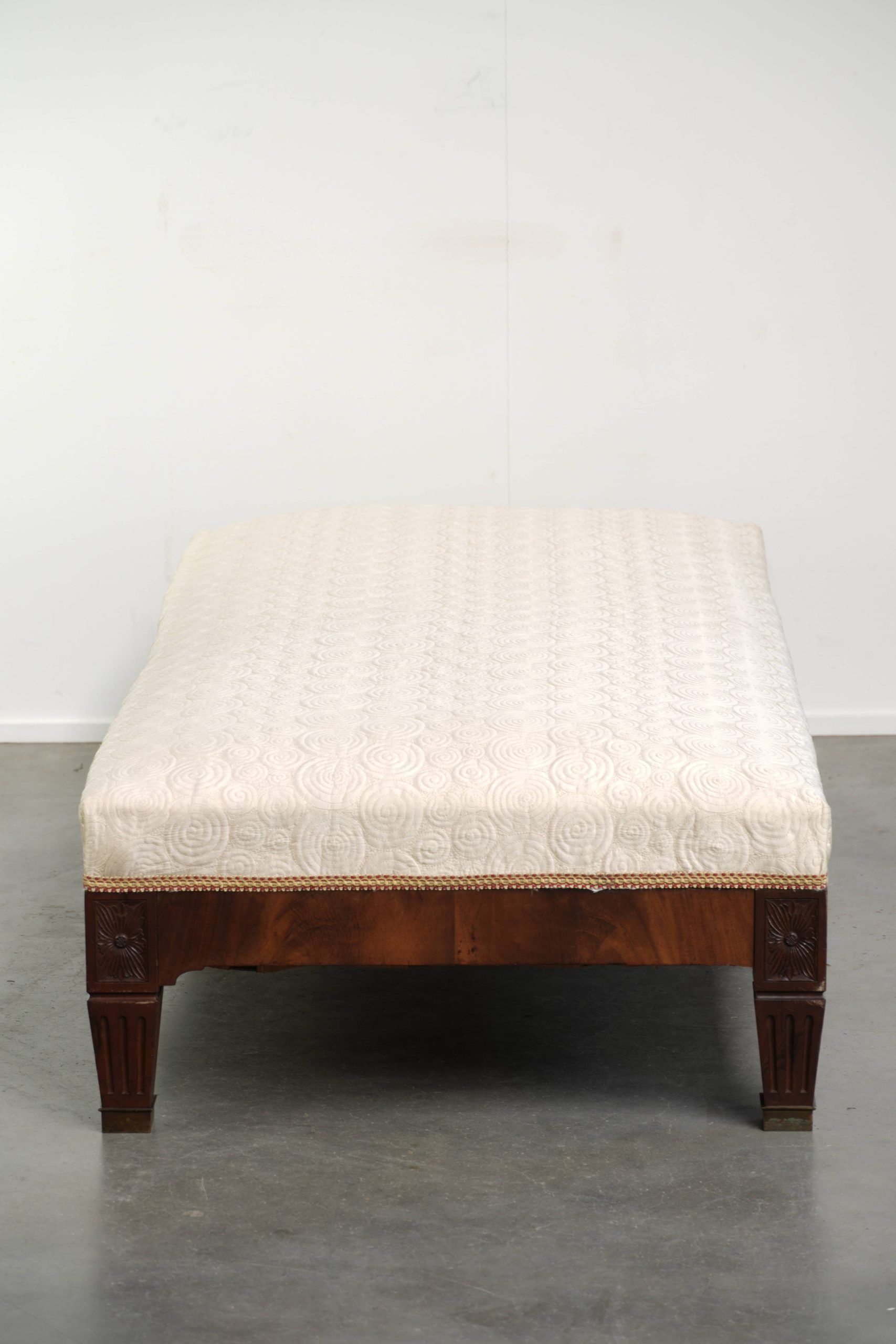 Antique French sofa from the 19th century in Empire style with a silk seat