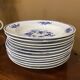 Set of 12 deep plates in Tournai porcelain, Boch Frères, fly decor