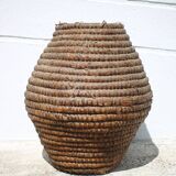 Old basket, burgundy straw and bramble, woven basket, interior decoration