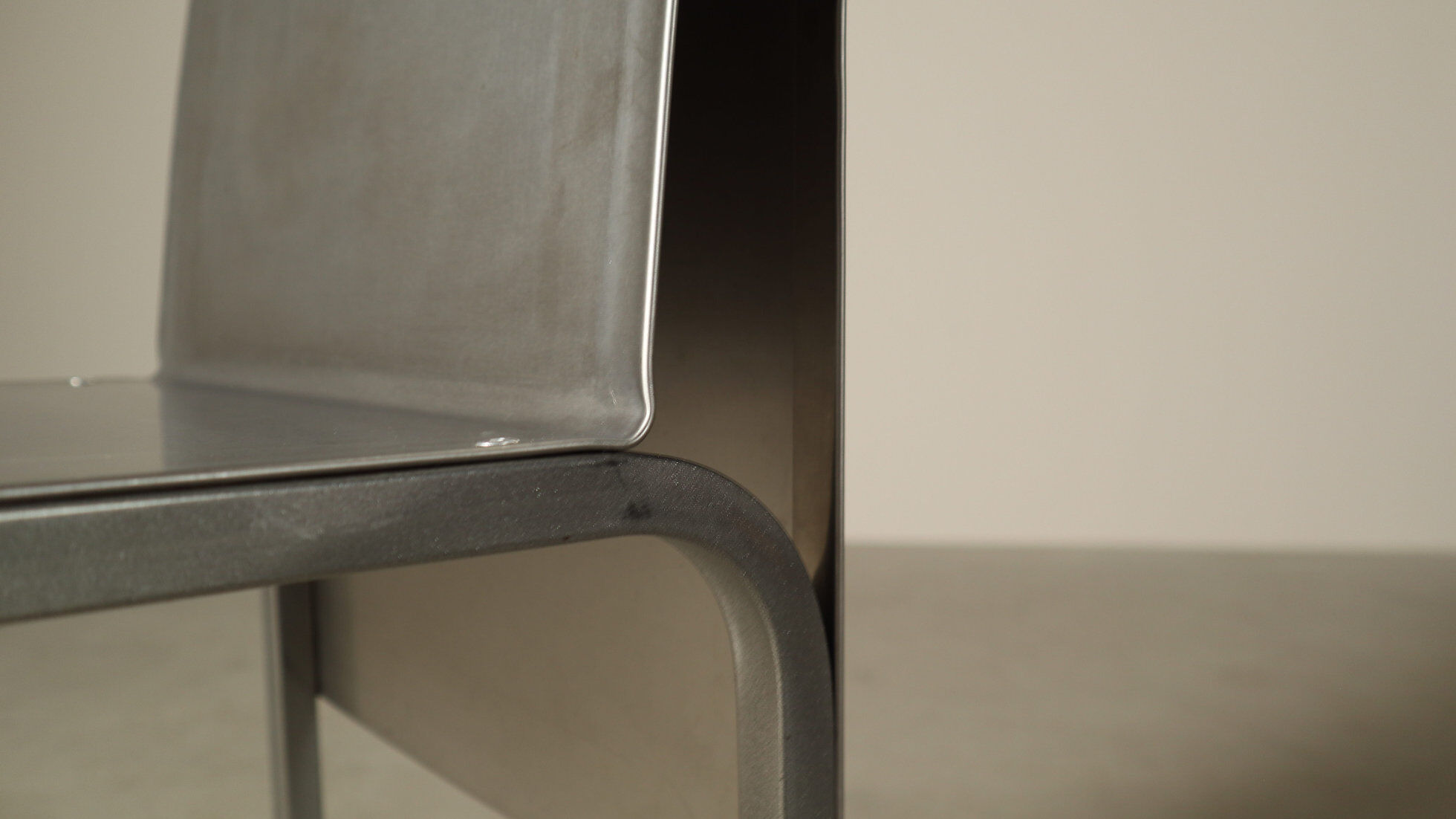 Set of six postmodernist stainless steel dining chairs from circa 1980-1990.