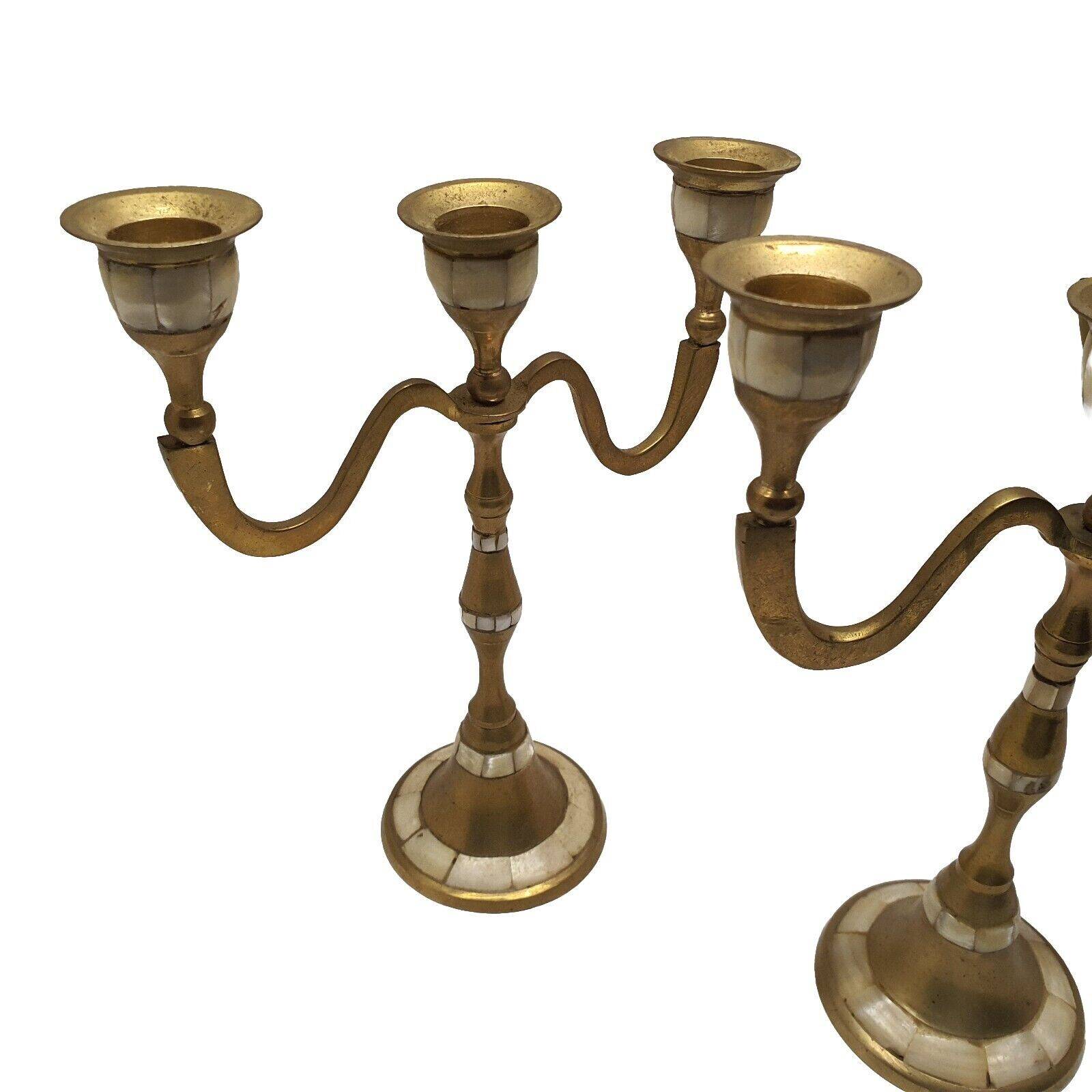 Set of 3-light brass candlesticks with mother-of-pearl intrusion