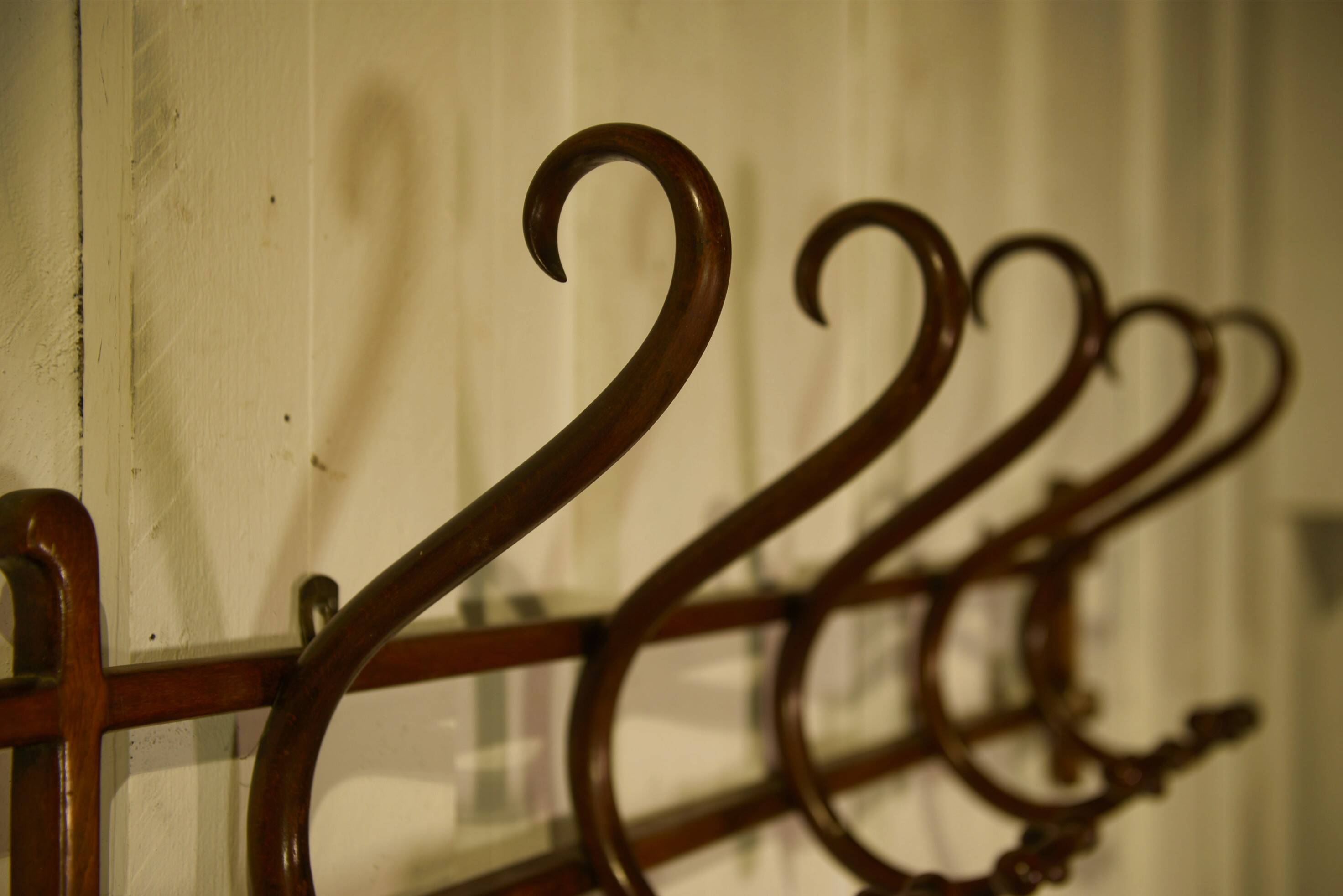 Curved beech wall coat rack published by Thonet, 1930s.