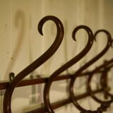 Curved beech wall coat rack published by Thonet, 1930s.