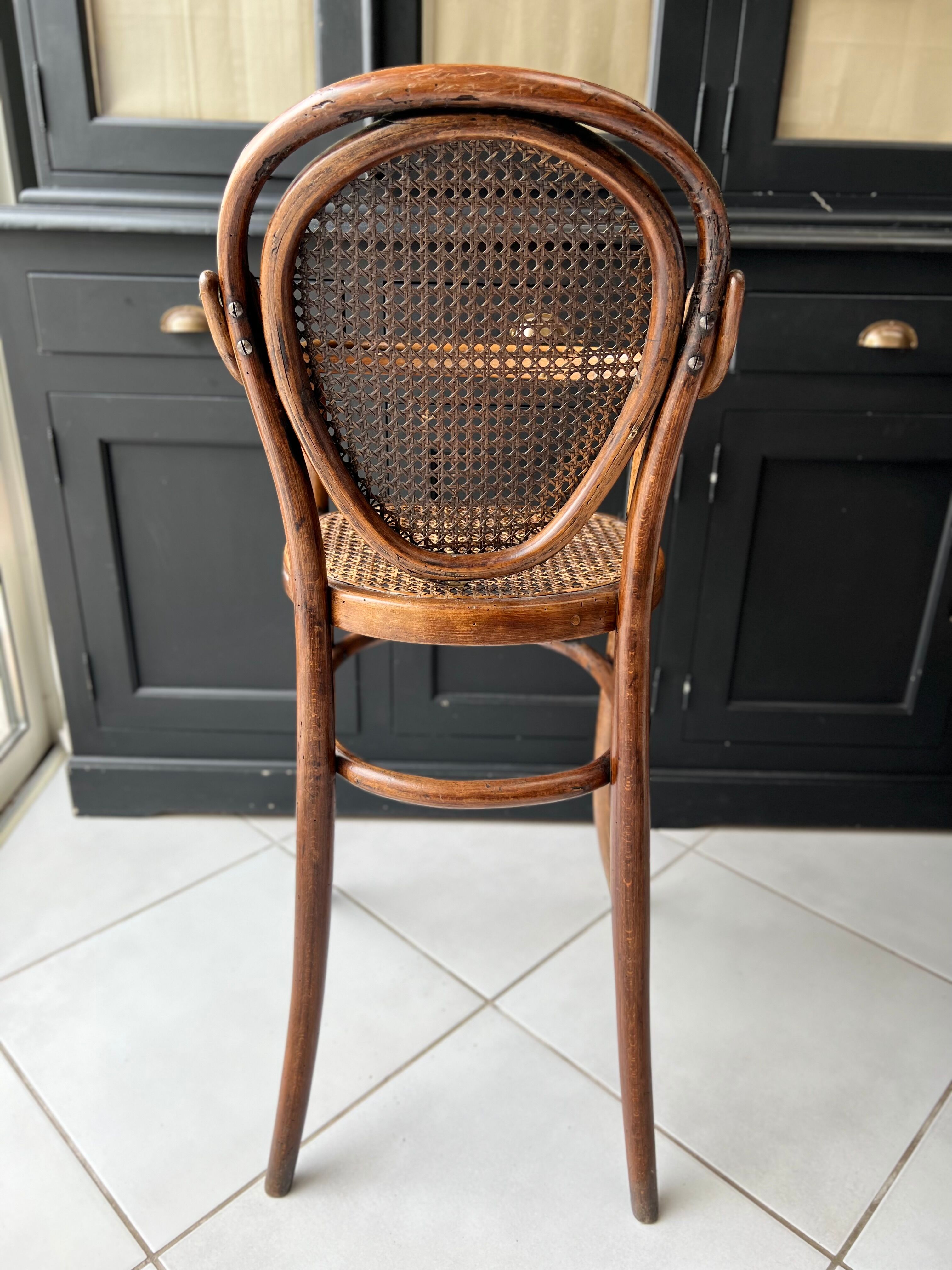 Rattan high chair cannages year 30