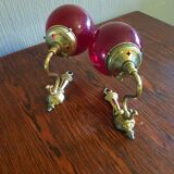 Pair of vintage brass wall light and cherry red globe